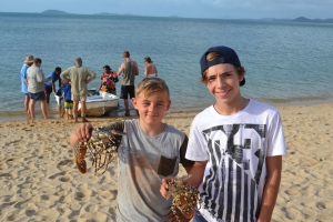Boys with their fresh crayfish @ Seisia