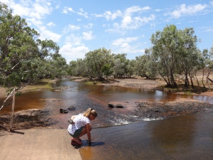 Brooke testing the crossing depth @ Hann River...